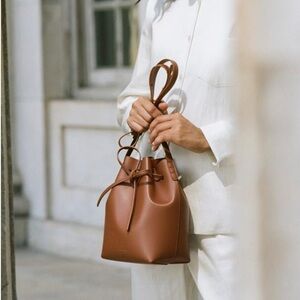MANSUR GAVRIEL LARGE BUCKET BAG AND POUCH IN CAMEL WITH CAMEL INTERIOR .